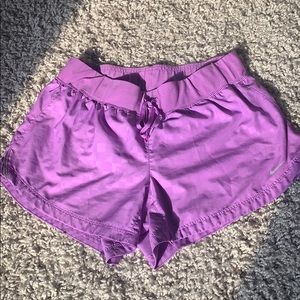 Purple Nike shorts